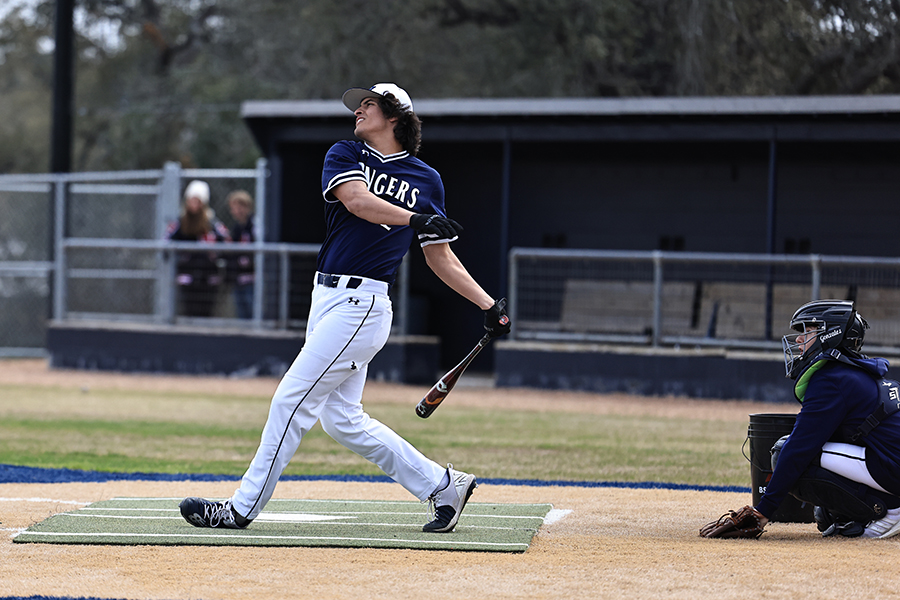 During baseball's media day Saturday, senior David DeHoyos belts one to the fences. He took first place by hitting three home runs in the finals.