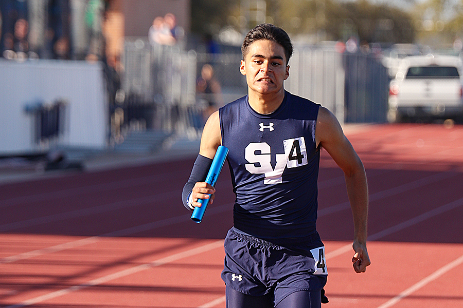 Senior Elijah Hudson competes in the 4X400m relay March 4 at Ranger Stadium. Hudson is advancing to area in the 200mm dash, 4X100m relays and the 4X400 m relay.