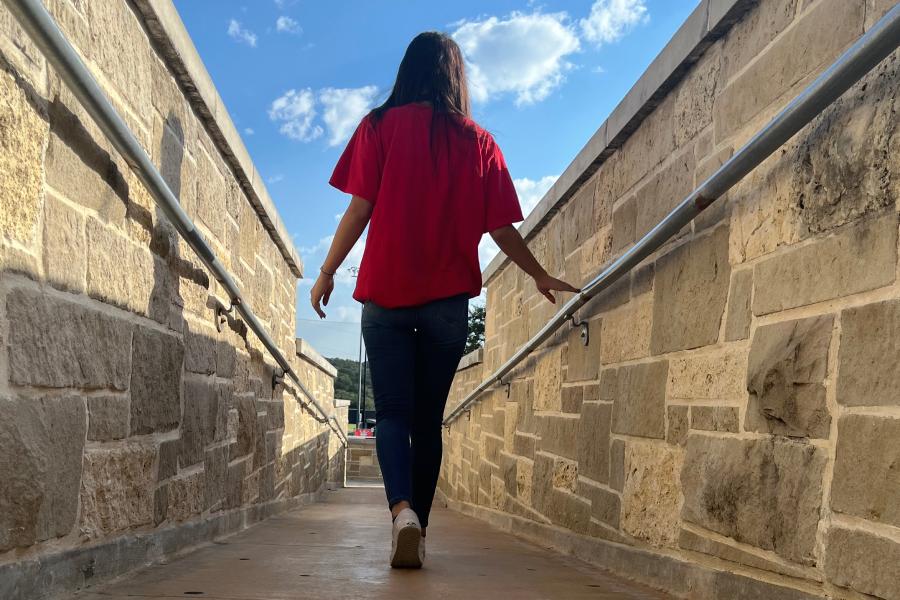 During a photo field trip last year on Sept. 9, then sophomore Matthew Felix snaps this image of Nadia Vargas using leading lines.