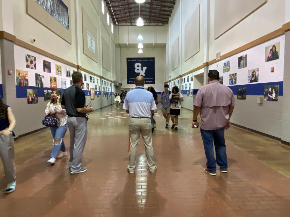 Assistant Principals Sy Douglass, Russell Doege and Tony Trevino monitoring the Rotunda during lunches.
