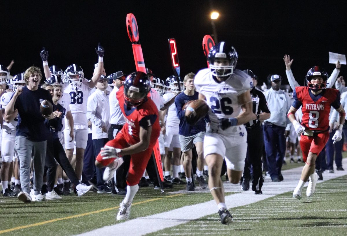 Junior running back Brad Sowersby has the End zone in his sights as he sprints past defenders.