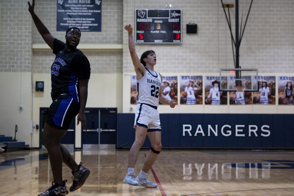 Jake Goode shooting a 3-pointer against San Marcos.
