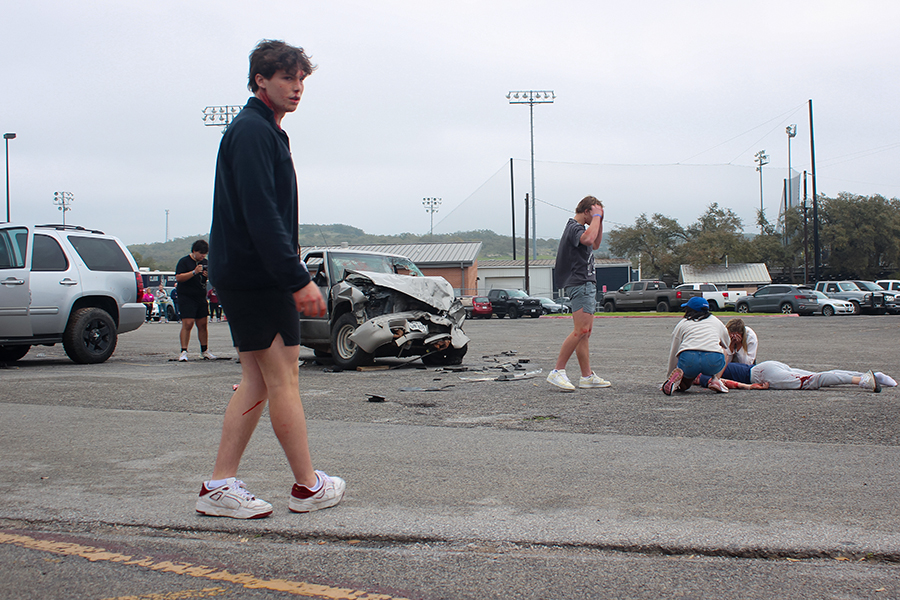 Senior Ryder Bonser takes a field sobriety test during the Shattered Dreams demonstration on March 7. He was later arrested for failing the Breathalyzer test.