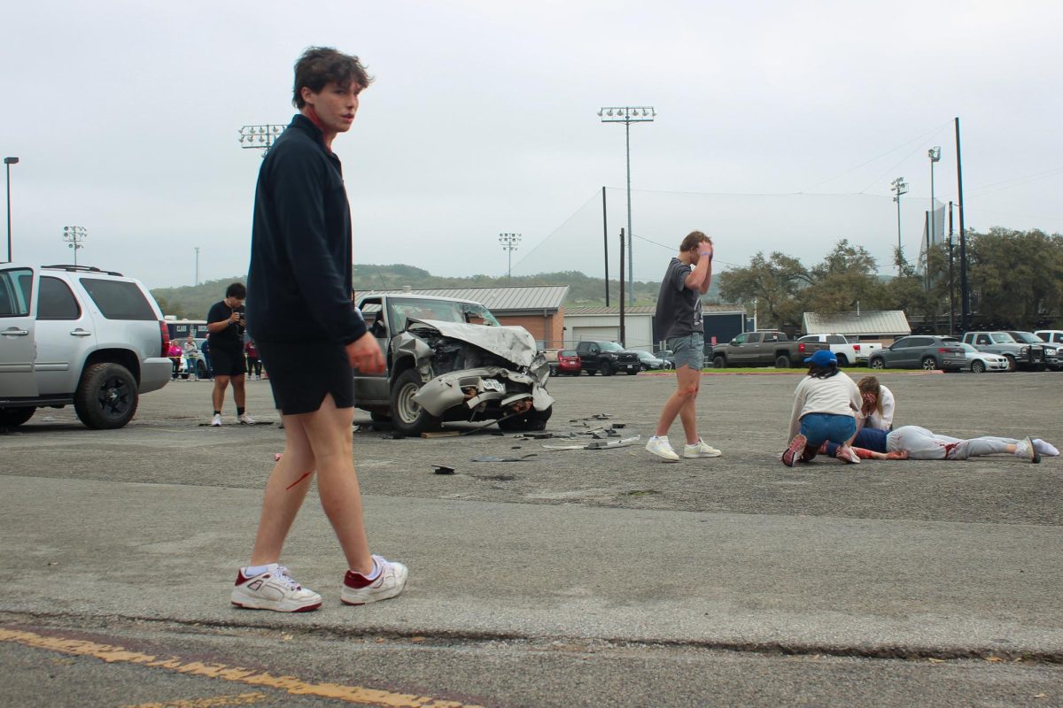 Senior Ryder Bonser takes a field sobriety test during the Shattered Dreams demonstration on March 7. He was later arrested for failing the breathalyzer test.