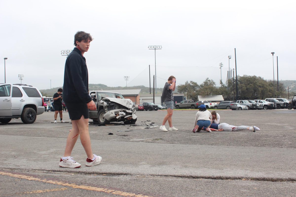 Senior Ryder Bonser takes a field sobriety test during the Shattered Dreams demonstration on March 7. He was later arrested for failing the breathalyzer test.