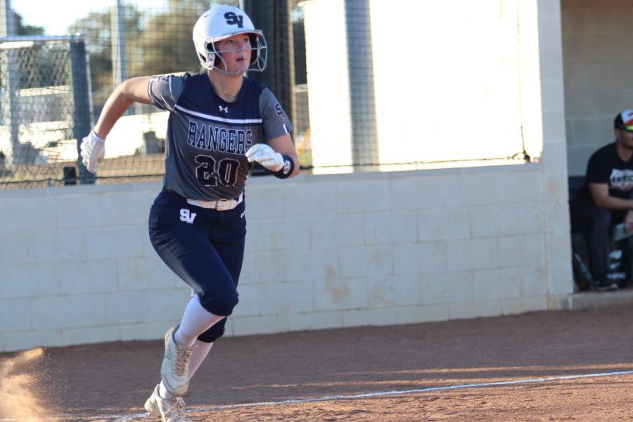 Sophomore Kamryn Prater runs the bases in attempt to make it back to home plate against her opponents from Tivy