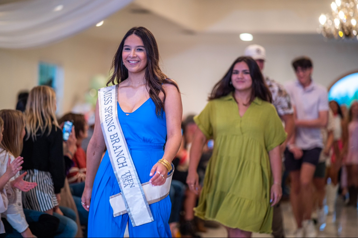 During last years fashion show runway senior Abbey Alcoser and senior Sophia Rosequist walk down the runway they helped create
