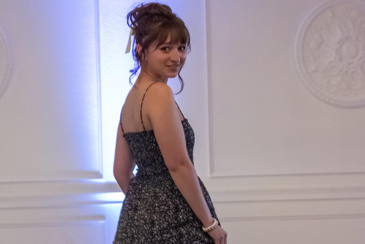 At the end of the runway, senior Kaya Poesch takes a look back before walking off