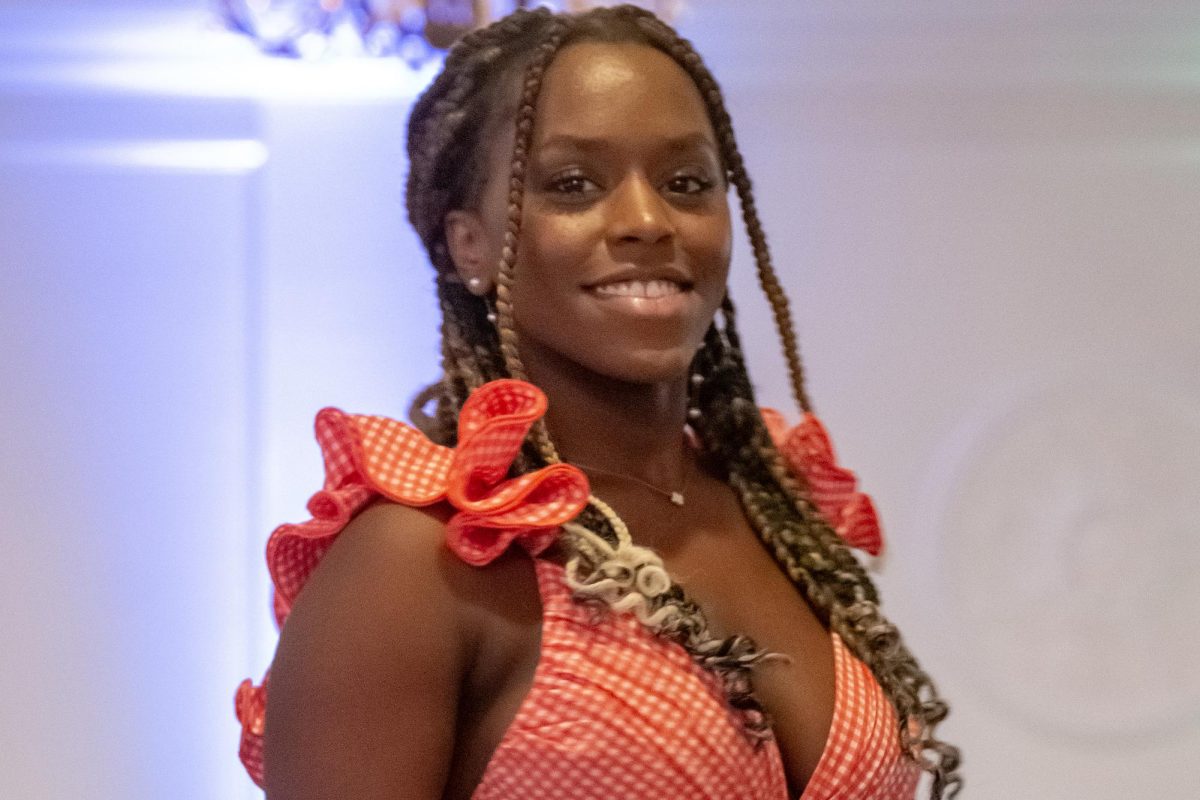 At the front of the runway junior Deonna Staley poses for the audience 