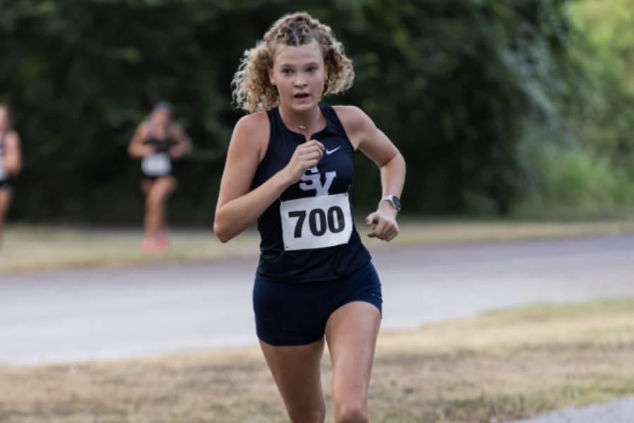 Junior Aubrey Pozzi races to the finish line during the Canyon XC Invitational. Pozzi's handwork payed off yesterday afternoon as she placed first overall in District 5A-26.